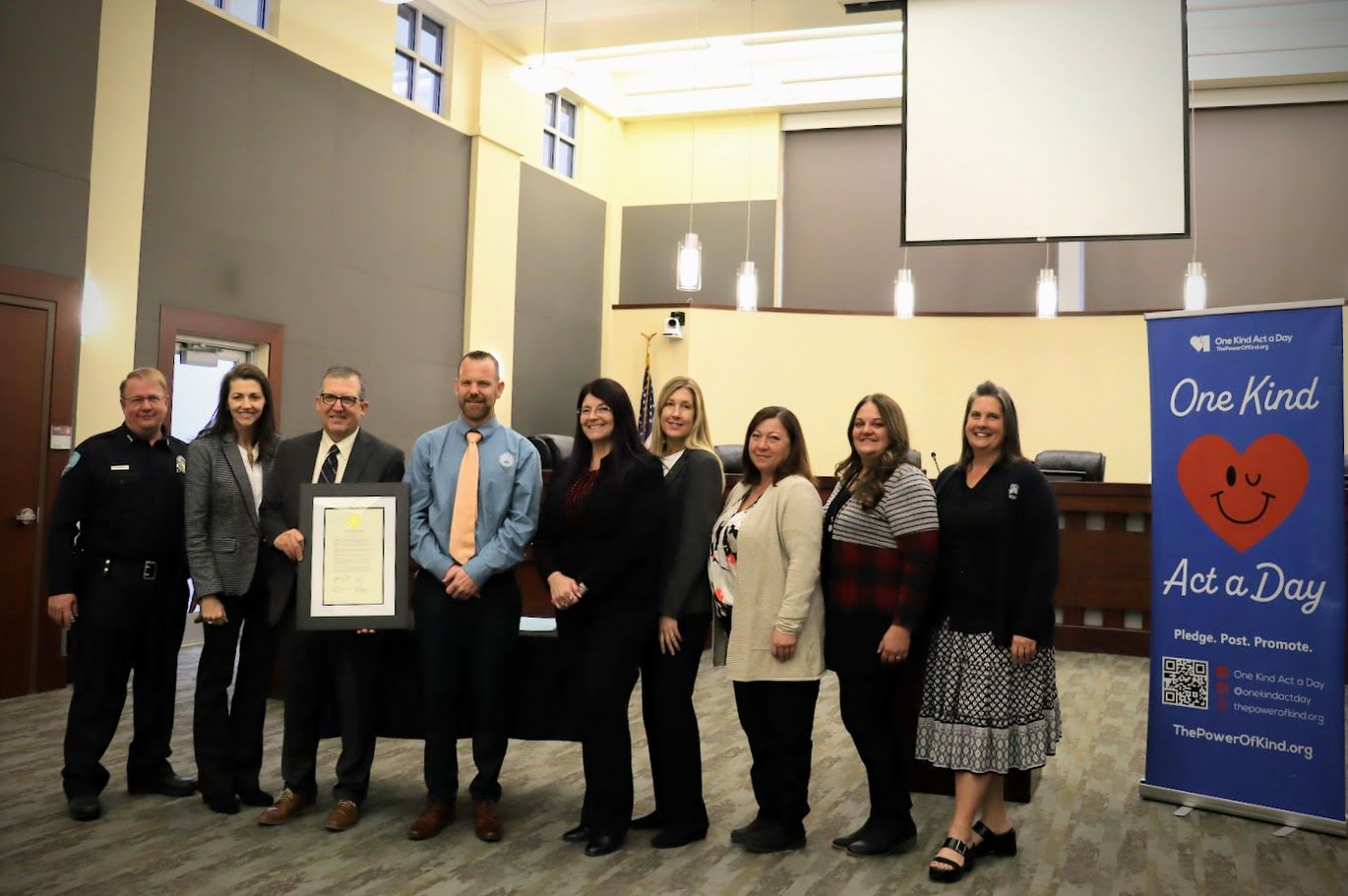 One Kind Act Award cert Ken Leethan and NSL Executive staff